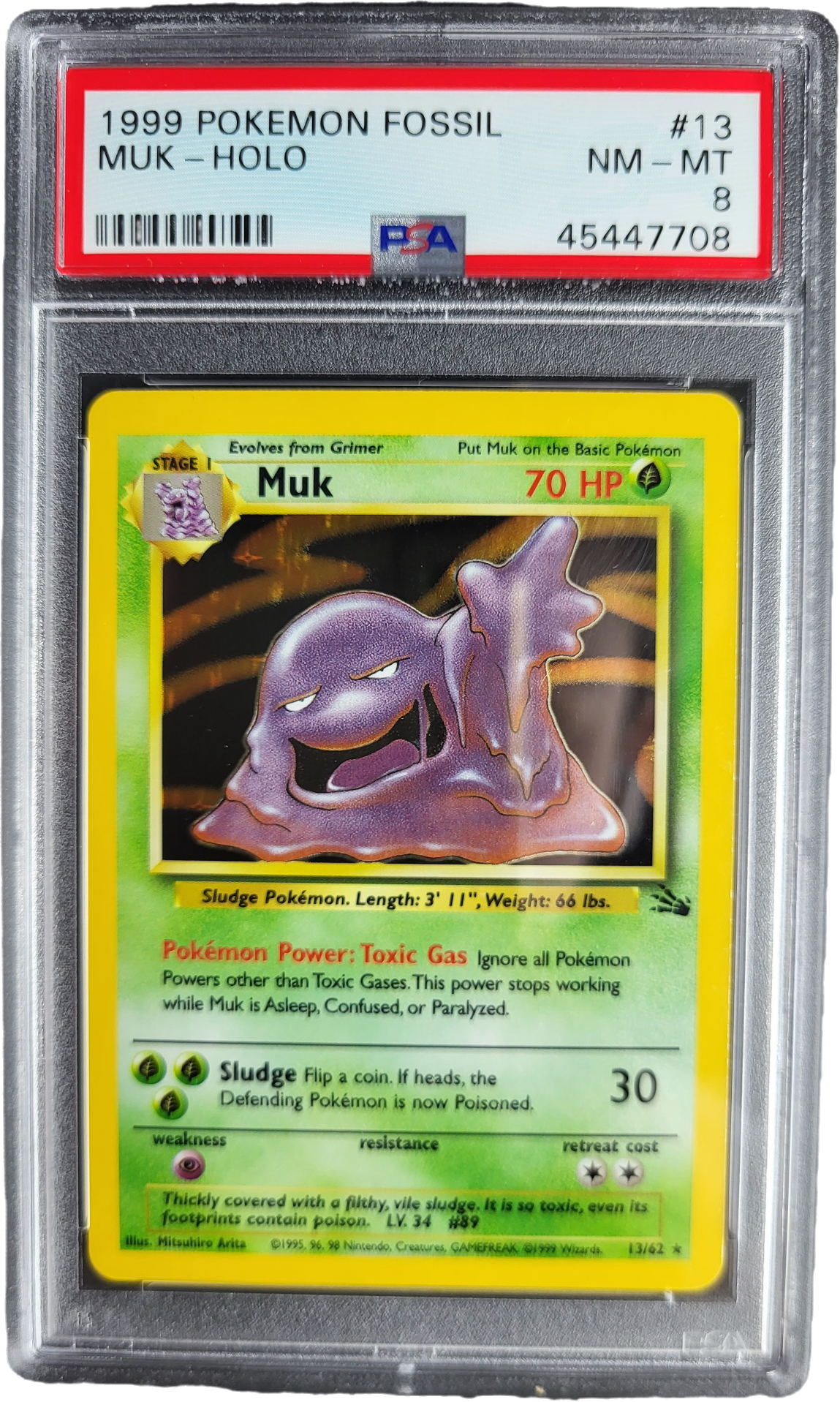 Muk 13/62 - 1999 Fossil Holofoil PSA 8